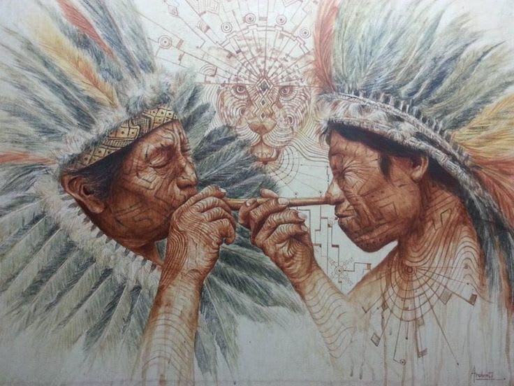 Two indigenous people blowing Rapé with Tepi